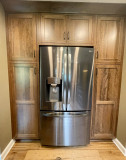  Amish Cabinetry, Cherry wood with a Pinecone stain. Viatera Nocturne quartz countertop.
