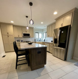Amish Kitchen Cabinetry, Maple, Painted Pottery on Perimeter, Oak, Timberlake Stain on Island, Hanstone Calacatta Extra Quartz Countertop