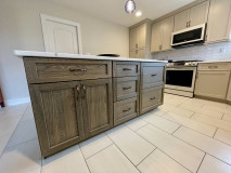 Amish Kitchen Cabinetry, Maple, Painted Pottery on Perimeter, Oak, Timberlake Stain on Island, Hanstone Calacatta Extra Quartz Countertop