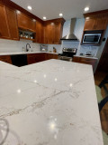 Waypoint, 470F Maple Cognac and Painted Sage, MSI Calacatta Viraldi Quartz