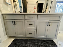 Waypoint cabinetry, 410F Painted Stone. MSI Calacatta Idillio quartz coutnertops.