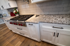 Custom Amish Kitchen, Maple Painted White on Perimeter,  Bianco Antico Granite Countertops